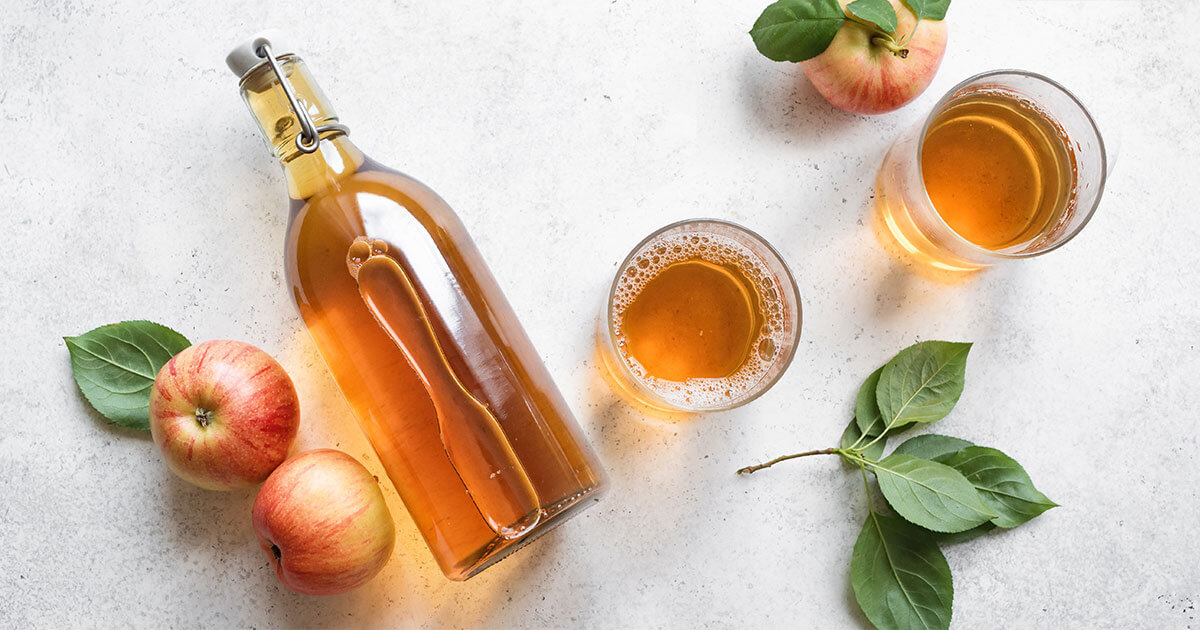 Dietary Sources of Heavy Metals apples and apple cider on a table